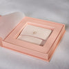 Thumbnail of Luxury box exposing a blush jewelery pouch to hold jewellery.