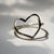 Top-down view of the Love Heart Ring in sterling silver.