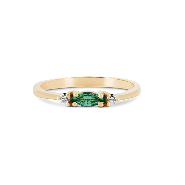 Front view of the Daydreamer Marquise Emerald & Diamond Ring in 14k polished gold, featuring a marquise-cut emerald flanked by two smaller diamonds on a polished band.