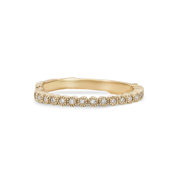 Front view of the Hawthorn Diamond Eternity Ring in 14k solid gold, featuring a continuous line of diamonds set on a textured twig band.