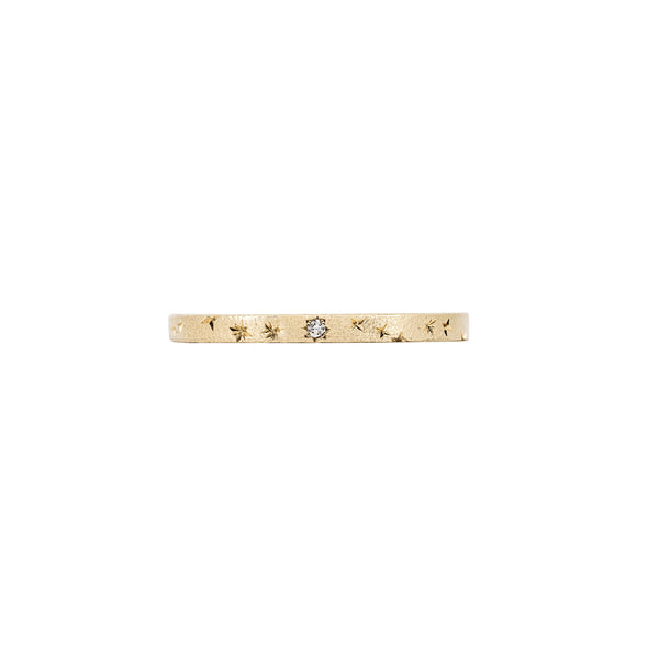 Alternative view of Side profile of the North Star 14k Gold Band Ring, showing the polished band and subtle star detail.