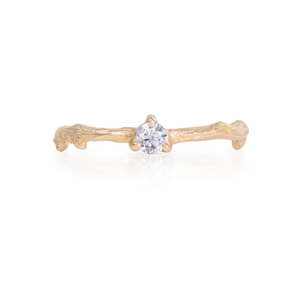 Front view of the Promise Me Diamond Ring in 14k gold with a twig band, featuring a single, round-cut diamond.