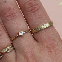 On-body shot of A Moment In Time - 14k Gold Engraved Coordinate Ring