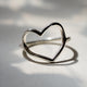Top-down view of the Love Heart Ring in sterling silver.