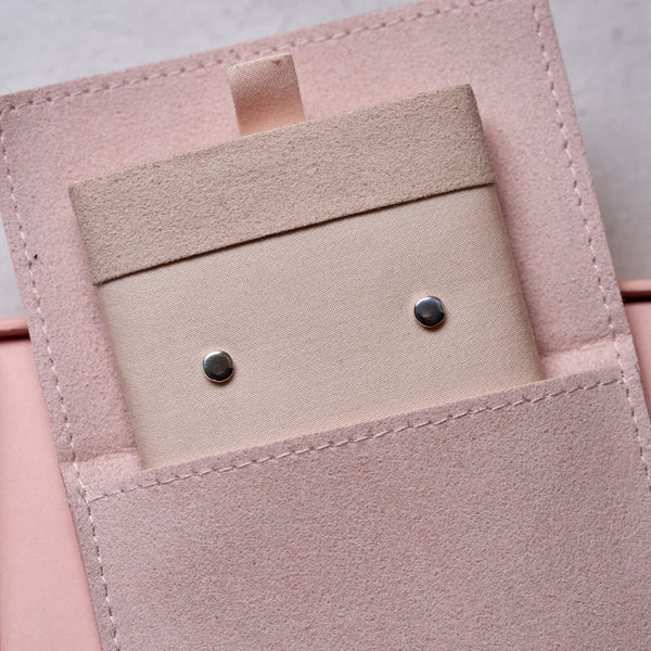 Alternative view of Close-up of the Sterling Silver Sun Stud Earrings, highlighting the sun shape.