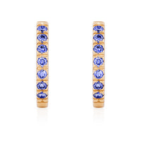 On-body shot of Tomorrow Eternity Huggie Earrings - 14k Gold Sapphire Earrings