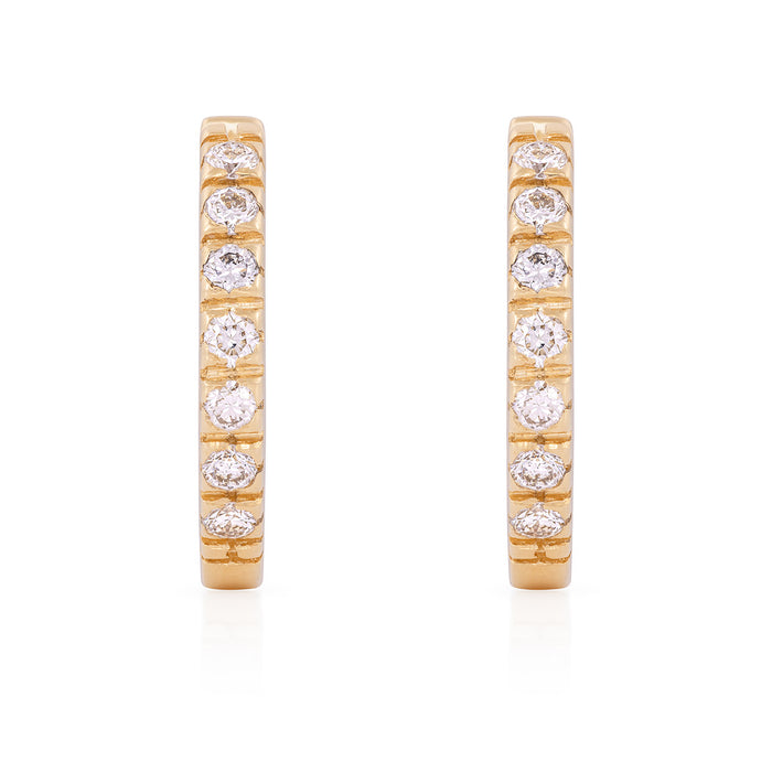 On-body shot of Tomorrow Eternity Huggie Earrings - 14k Gold Diamond Earrings