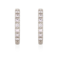 On-body shot of Tomorrow Eternity Huggie Earrings - 14k White Gold Diamond Earrings