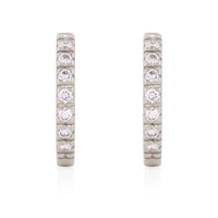 On-body shot of Tomorrow Eternity Huggie Earrings - 14k White Gold Diamond Earrings