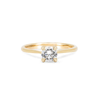 Front view of the Darling Solitaire Diamond Engagement Ring in 14k gold, featuring a 0.5ct solitaire diamond and polished band.