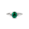Thumbnail of Front view of the Dewlight Emerald Engagement Ring in 14k white gold, featuring a large oval stone on a polished band.