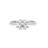 Front view of the Hero Radiant Cut Three Stone Diamond Engagement Ring in 14k white gold, featuring a central 1ct radiant-cut diamond flanked by two smaller diamonds on a polished band.