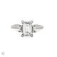 Front view of the Hero Emerald Cut Three Stone Diamond Engagement Ring in 14k solid white gold, featuring a central 2ct emerald-cut diamond flanked by two smaller diamonds on a polished band.