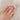 Alternative view of Close-up of a hand wearing the Darling Solitaire Diamond Engagement Ring in 14k solid gold, on a polished band.