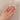 Alternative view of Close-up of a hand wearing the Dewlight Emerald Engagement Ring in 14k solid gold, on a polished band.