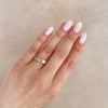 Thumbnail of Close-up of a hand wearing the Hawthorn Bark Men's Wide Wedding Band in 14k gold.