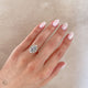 Close-up of a hand wearing the Queen of Hope 2.7ct Lab-Diamond Engagement Ring