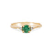 Front view of the Love is All Emerald Engagement Ring in 14k solid gold with a twig band, featuring a brilliant cut emerald.