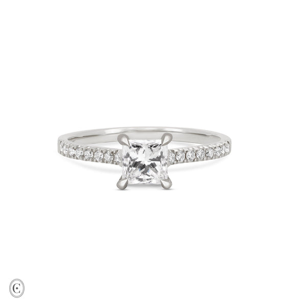 Front view of the Love’s Life Eternity Princess Cut Diamond Engagement Ring in 14k white gold, featuring a princess-cut diamond with an eternity-set band.