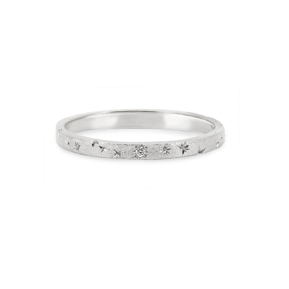 Front view of the North Star 14k White Gold Band Ring, a polished band featuring a single star motif.