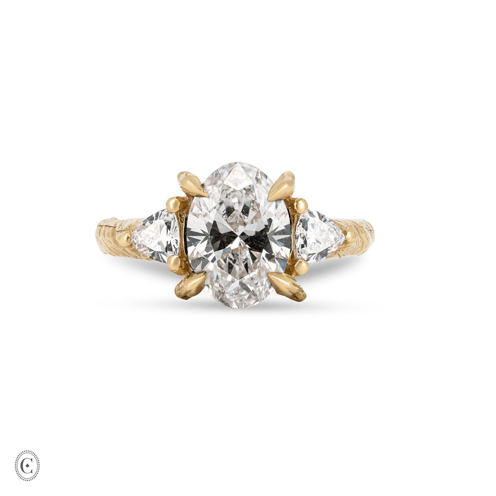 Front view of the One in a Trillion 2.4ct Lab-Grown Oval Diamond Engagement Ring in 14k gold with a twig band.