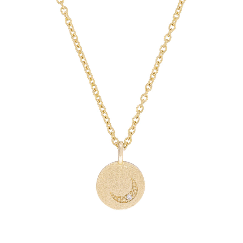 Front view of the Sun, Moon & Stars Diamond Necklace in 14k gold, featuring a circular pendant with star, moon, and sun motifs.