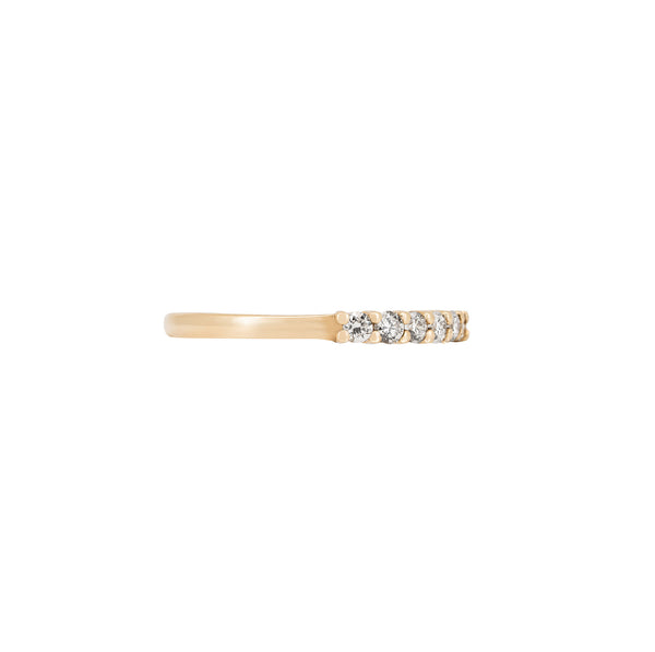 Alternative view of Side profile of the Tomorrow Diamond Eternity Ring in 14k polished gold, showcasing the polished band and half eternity setting.