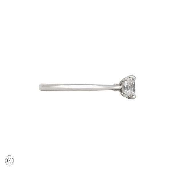 Alternative view of Side profile of the Guiding Light Trilogy Oval Diamond Engagement Ring in 14k white gold, showcasing the polished band and three-stone setting.