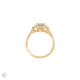 Top-down view of the You, Me & Magic Round Cut Three Stone Engagement Ring in 14k solid gold, with a textured twig band.