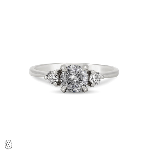 Front view of the You, Me & Magic Grey Diamond Engagement Ring in 14k white gold, featuring a polished band and a large central grey diamond flanked by two smaller diamonds.