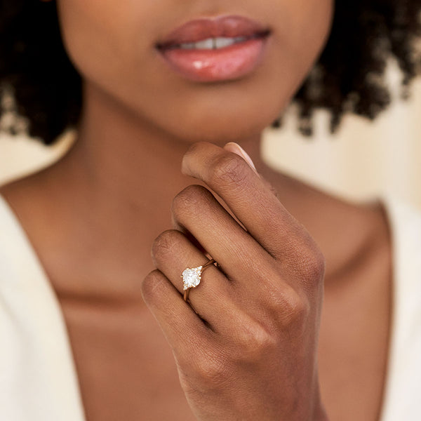 On-body shot of Dewlight 1ct Lab-Grown Diamond Oval Engagement Ring - 14k Gold Polished Band