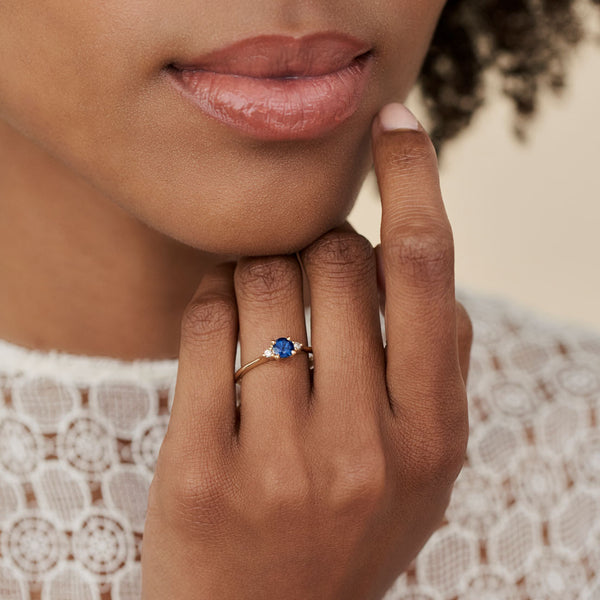 On-body shot of Love is All 0.5ct Blue Sapphire Engagement Ring - 14k Gold Polished Band