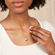 Close-up of the North Star Diamond Necklace in 14k gold, highlighting the delicate star pendant.