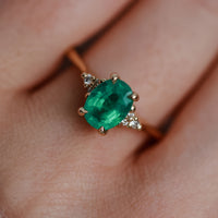 On-body shot of Dewlight 1ct Emerald Oval Engagement Ring - 14k White Gold Polished Band